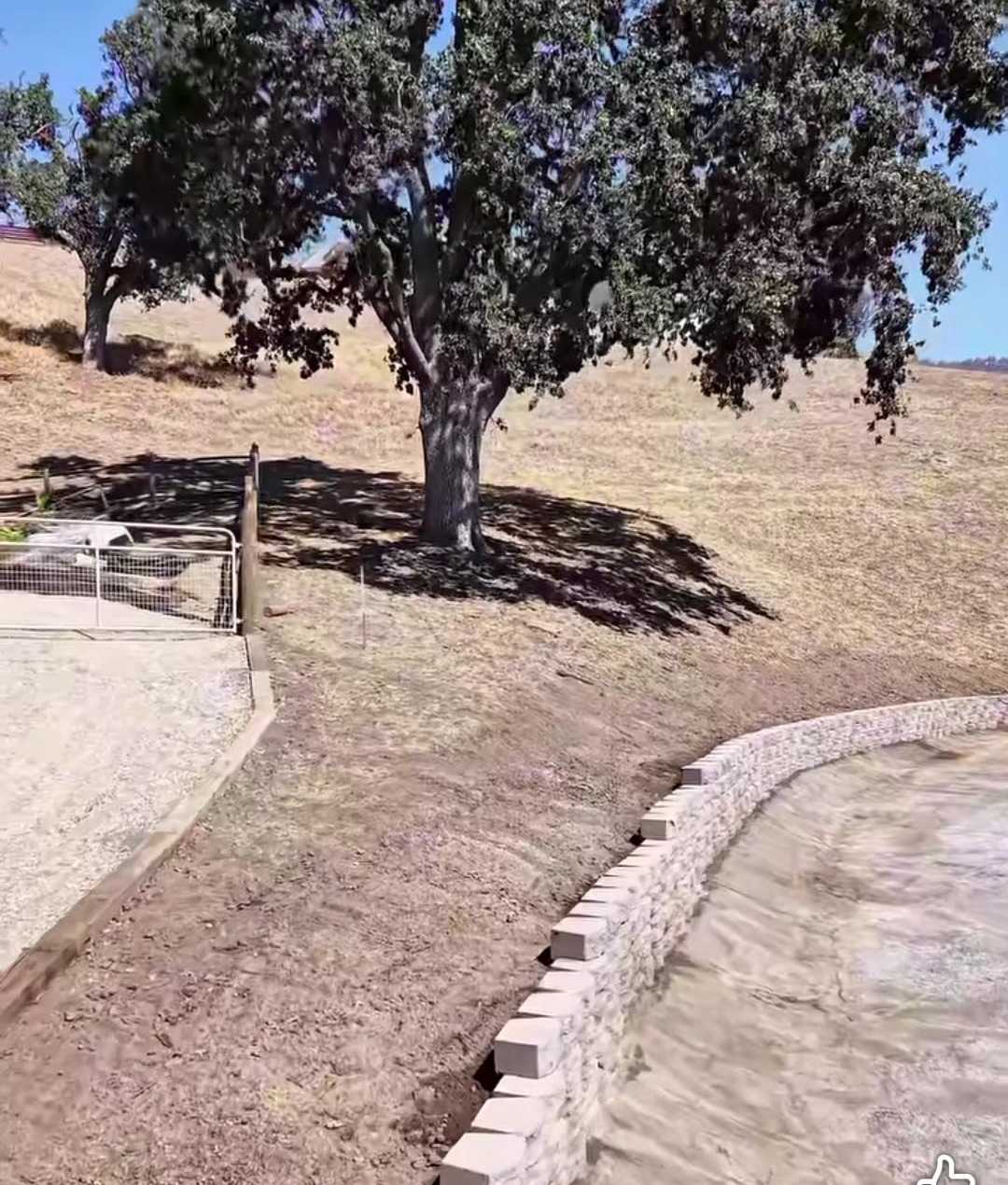 A block wall running along a slope